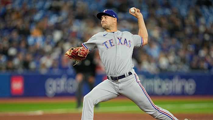 Apr 10, 2022; Toronto, Ontario, CAN; Texas Rangers pitcher Brock Burke (46) pitches to the Toronto Blue Jays during the fourth inning at Rogers Centre. Mandatory Credit: John E. Sokolowski-USA TODAY Sports